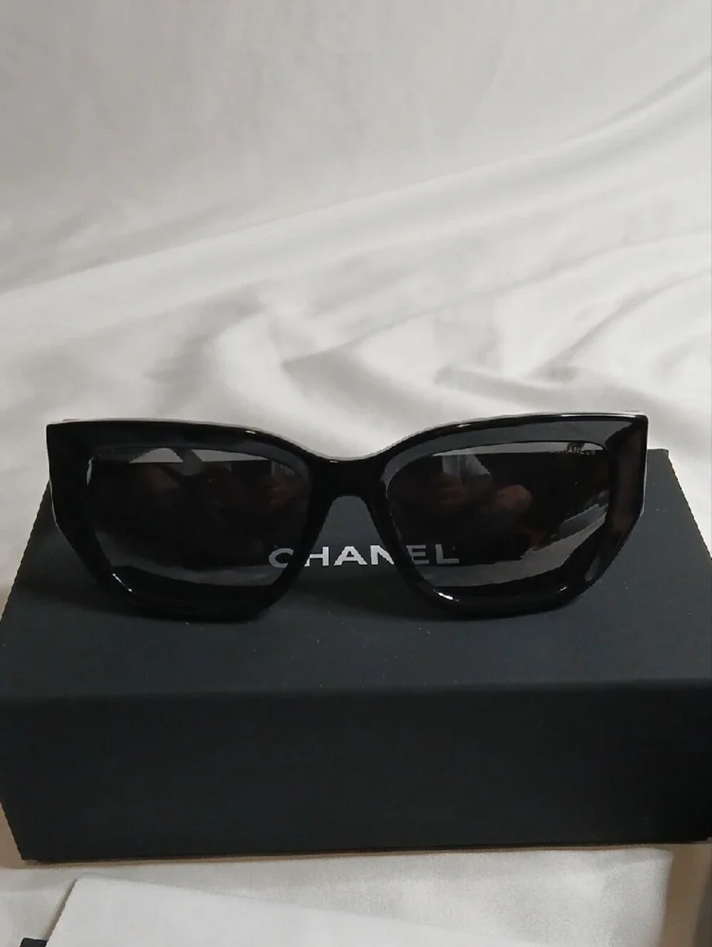 CHANEL Black Cat-Eye Sunglasses with White/Silver CC Emblem